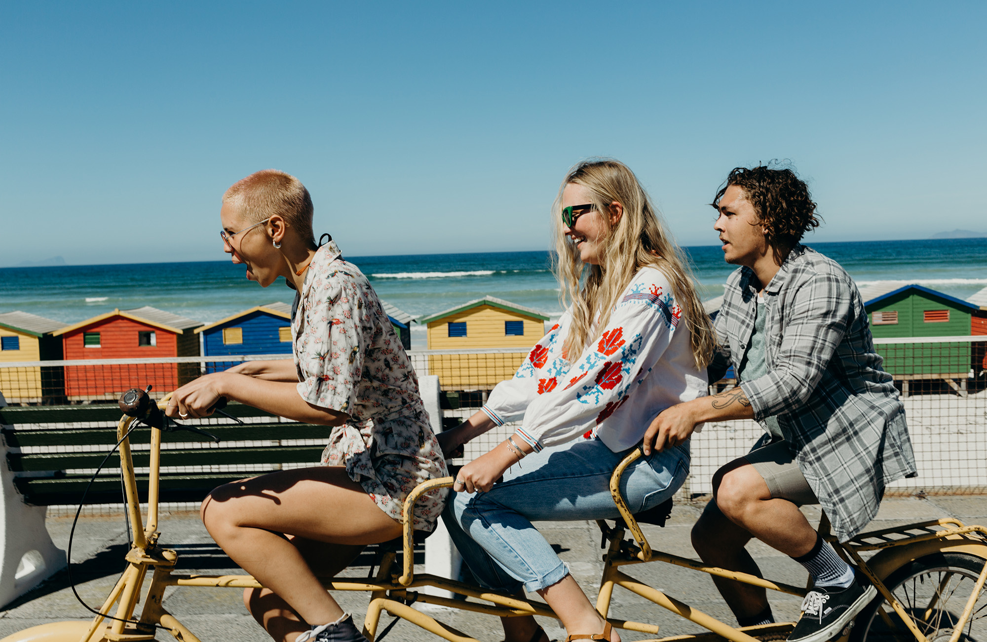 happy-people-on-tandem-bike-beach-cover