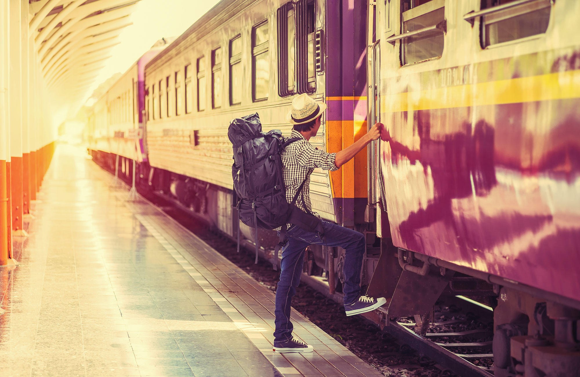 train-asia-backpacker-boarding-train