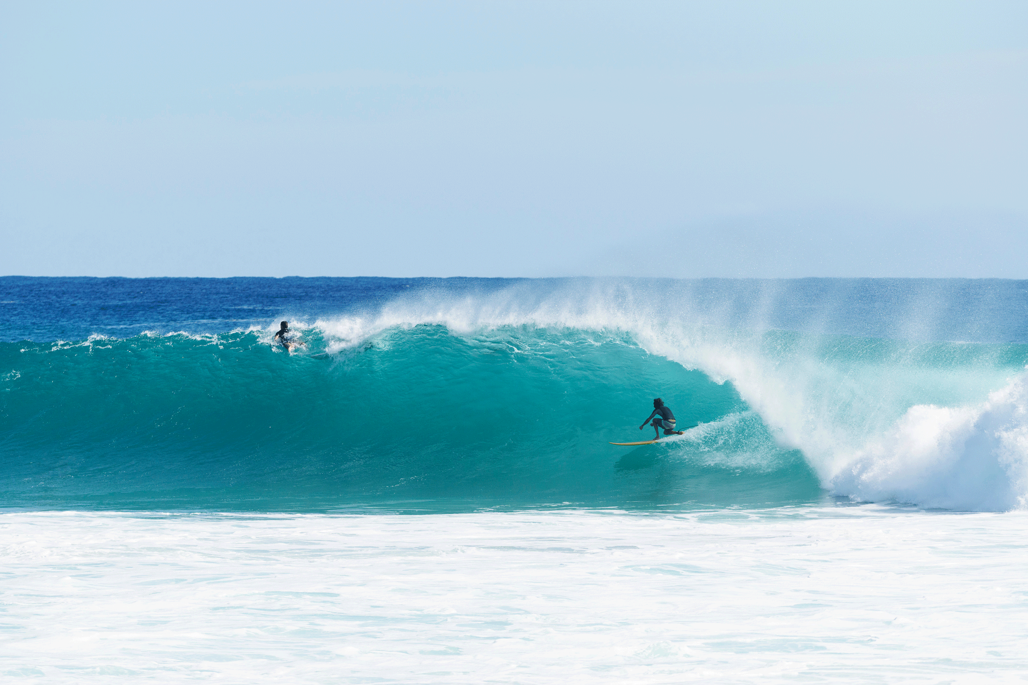 Surfers Braving Big Waves At Kirra In Queensland, Australia