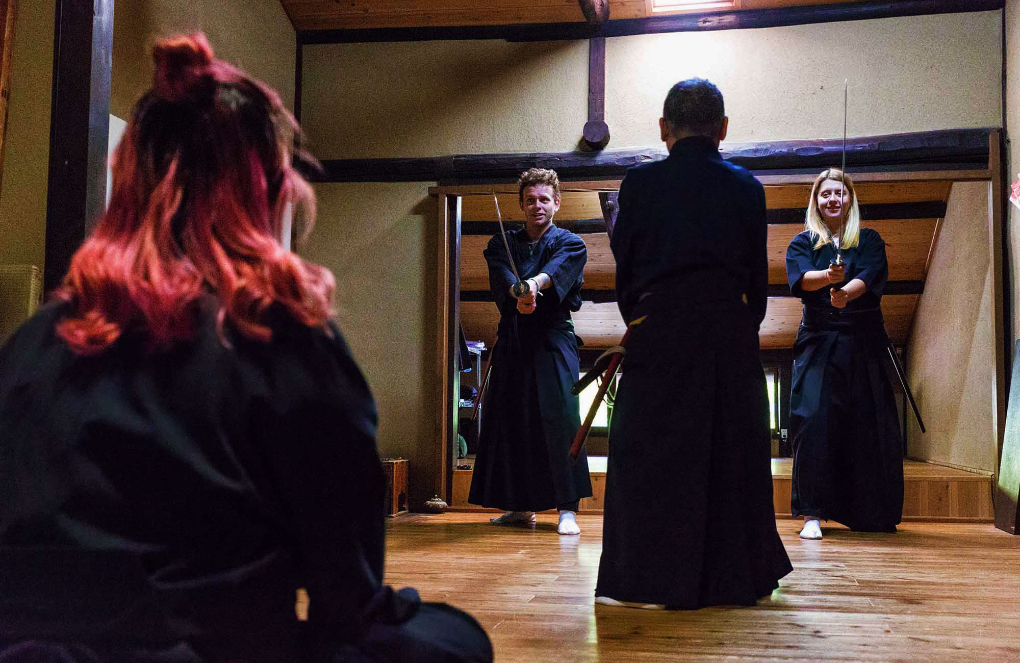 Travellers partaking in Samurai training in Japan